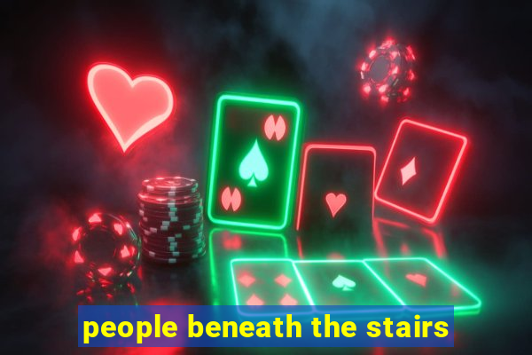 people beneath the stairs